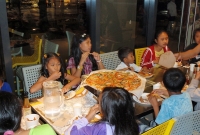 jl-tucking-in-to-pizza-P1010777.jpg